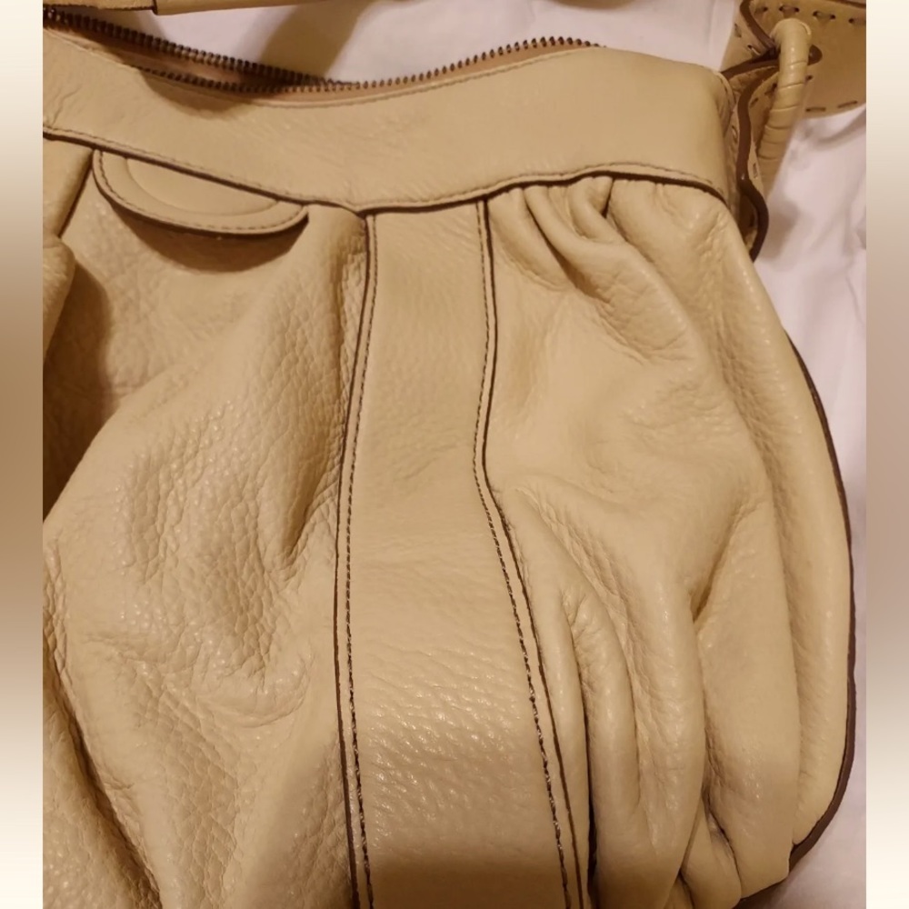 Beautiful Cole Haan muted beige / yellow color